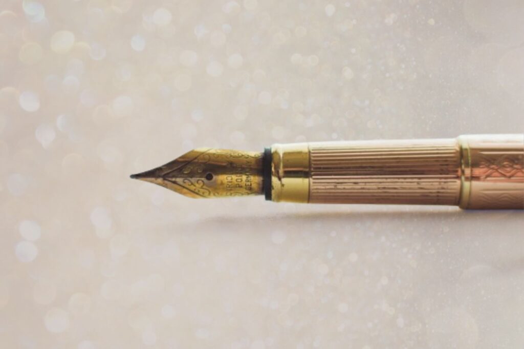 Picture of an old tint pen over a light background